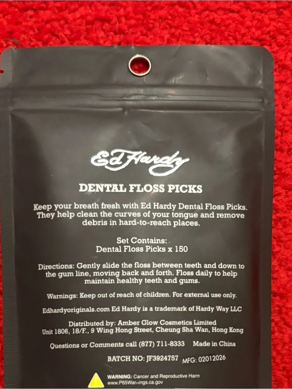 Ed Hardy Black Pouch with White Dental Floss Picks